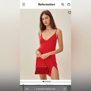Sexy red dress with side slit. Selling because a little too tight on me